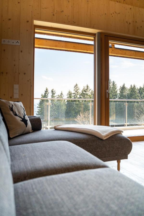 Holzhaus "Zum Schwarz'N" Appartement Aurach am Hongar Buitenkant foto