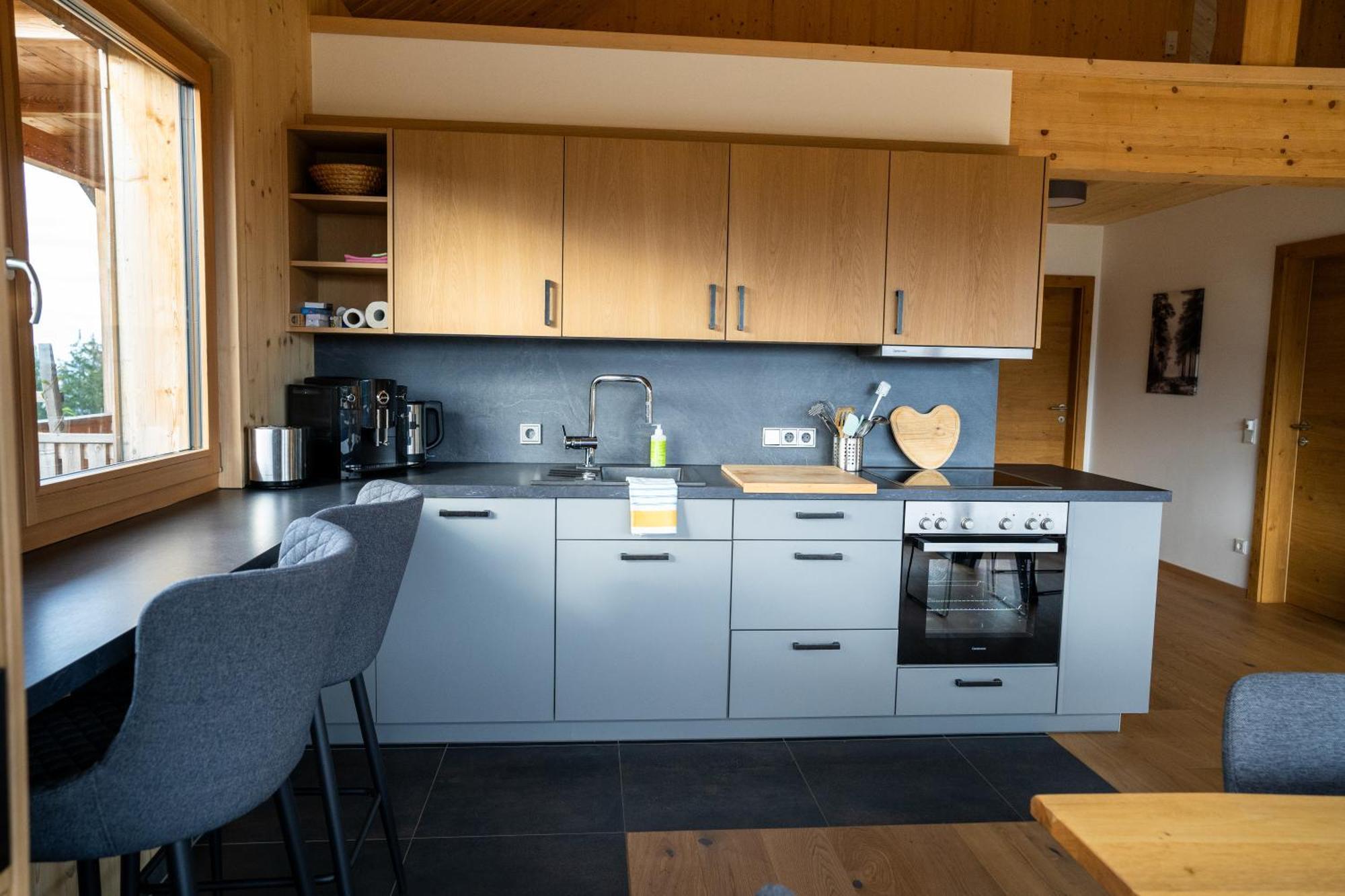 Holzhaus "Zum Schwarz'N" Appartement Aurach am Hongar Buitenkant foto
